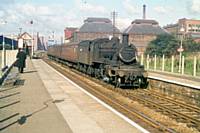 11 British Railways standard class 2 number 78063 with a Rochdale to Wigan train in 1962.  R S Greenwood